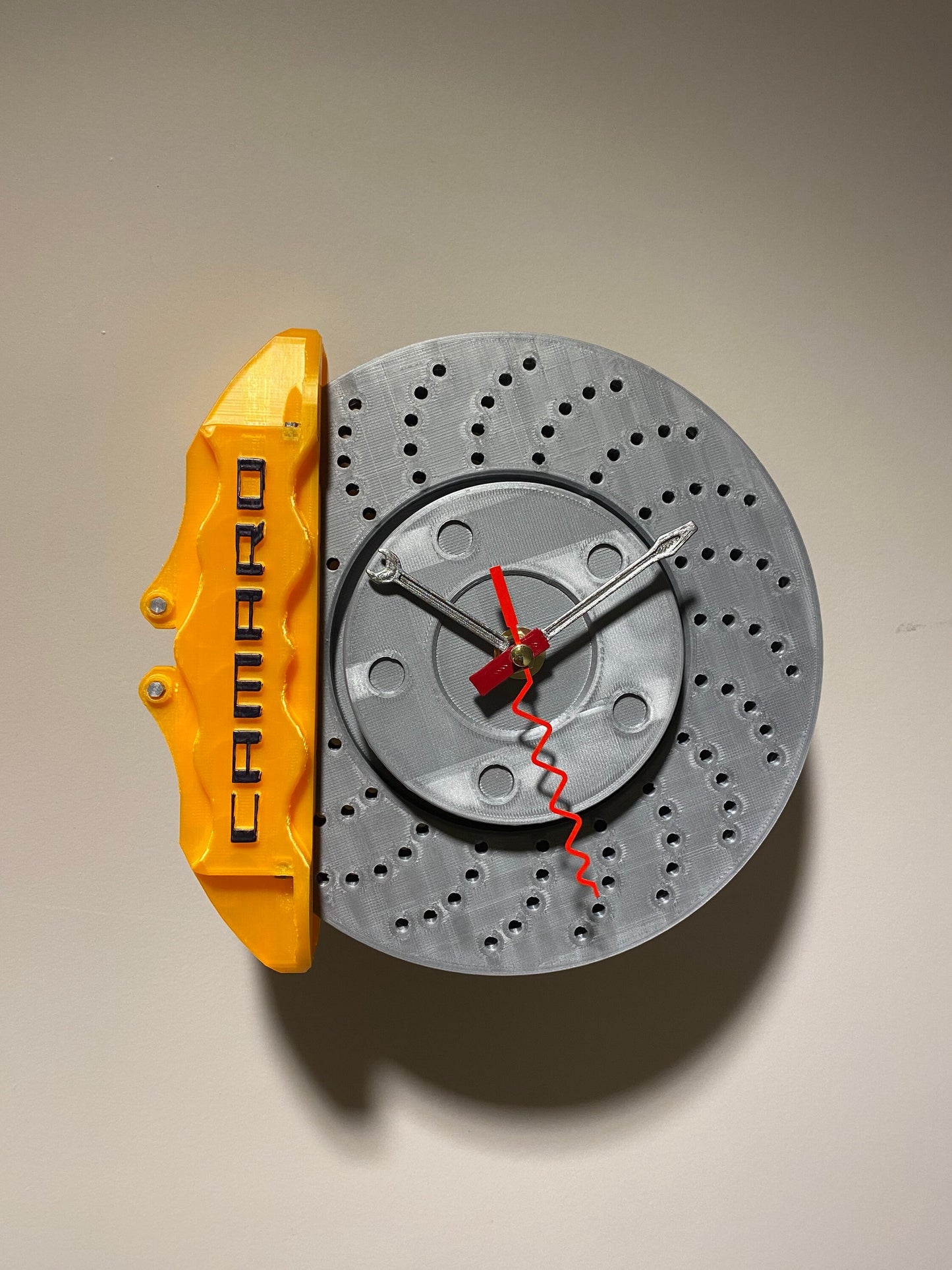 Caliper brake wall clock