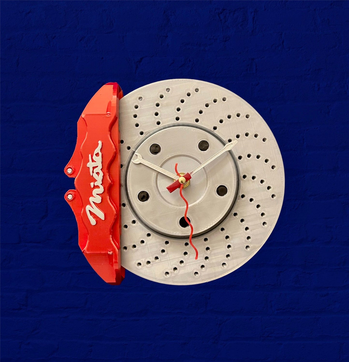 Caliper brake wall clock